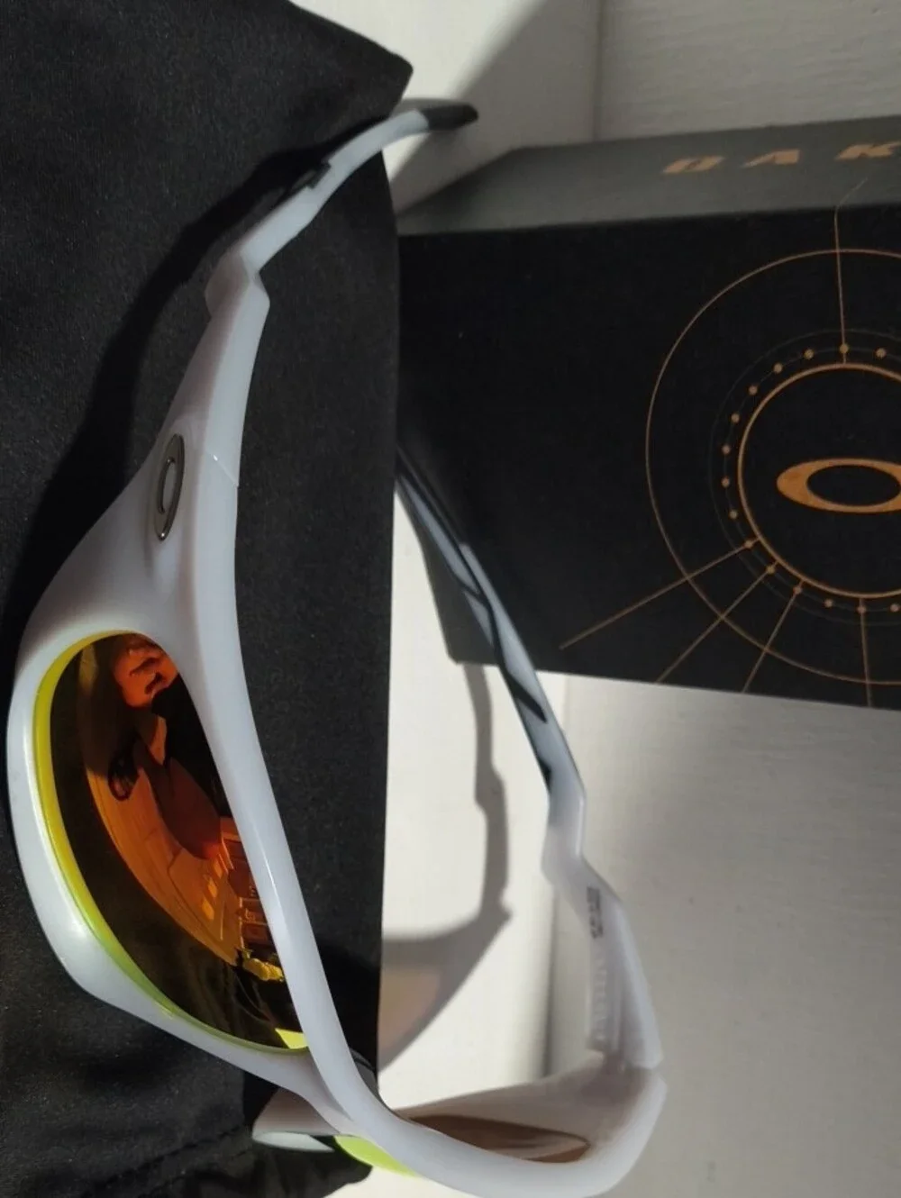 Oakley Clear Frame Sunglasses with Ruby-Red Polarized Lenses